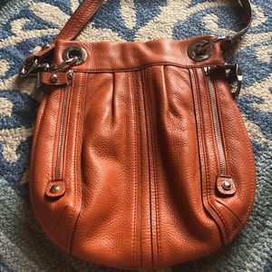 B. Makowsky orange leather crossbody